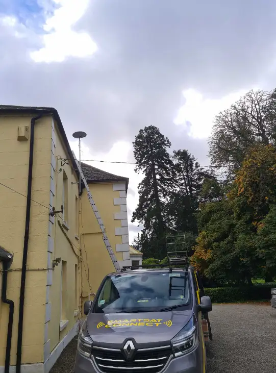 starlink antenna being installed on a residential property